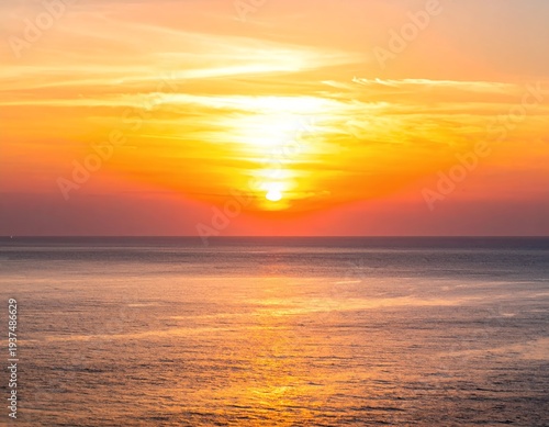 Wallpaper Mural Vibrant Ocean Sunset with Golden Hues and Reflective Waters. Torontodigital.ca