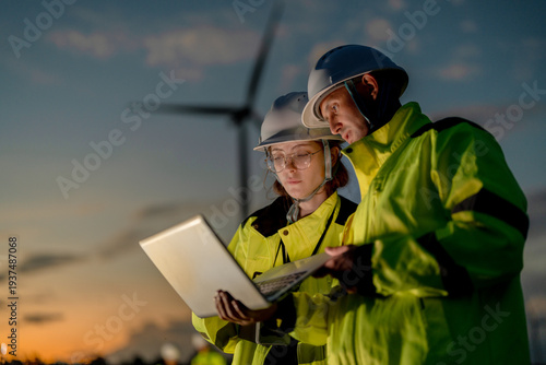 Konstfotografi Green collar workforce using advanced tech to manage sustainable wind power