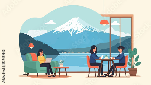 Women working on laptops in a cafe with mountain and lake view