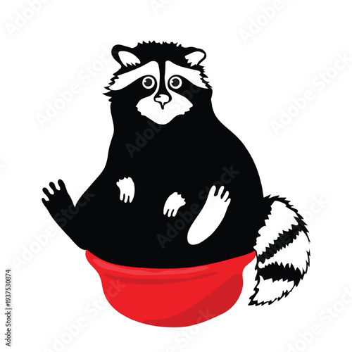 Funny raccoon sitting in a red basin