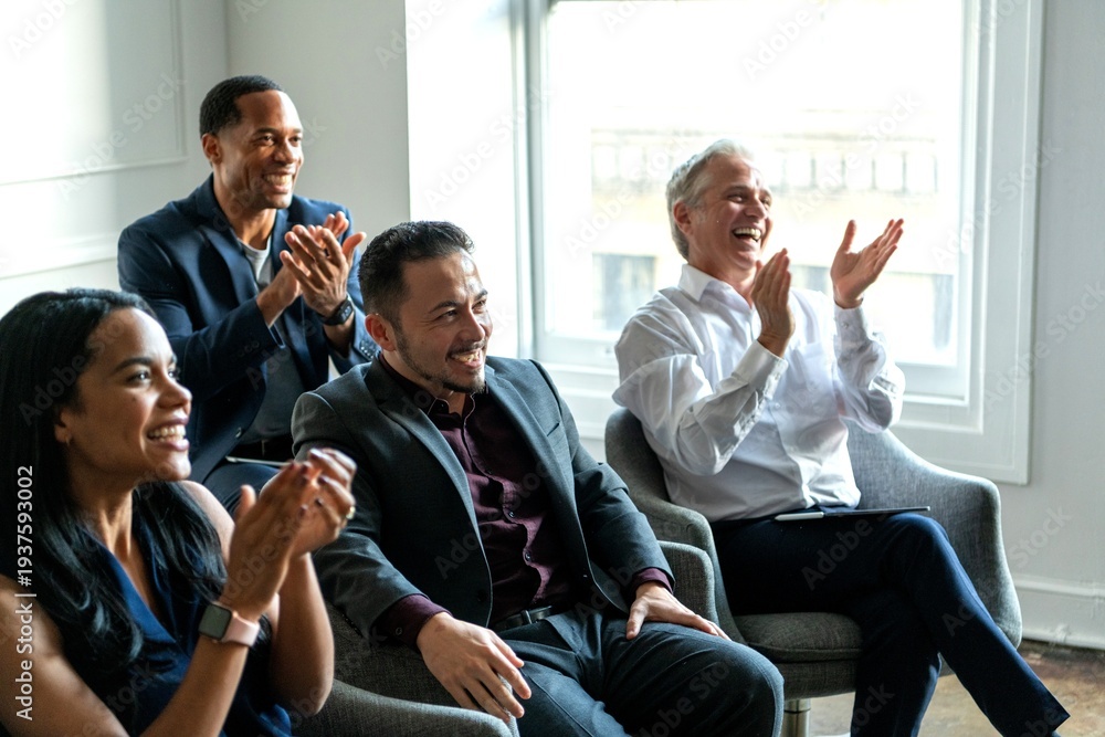 Obraz premium Diverse professionals applauding success.