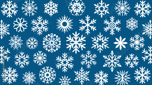 Collection of white snowflakes on a blue background.