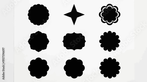Collection of black decorative shapes and floral elements.