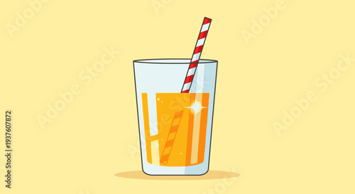 Orange juice in glass with striped straw on yellow background