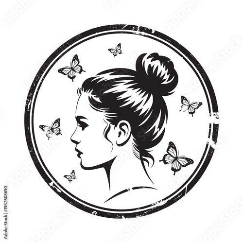 Monochrome portrait of a woman with an updo hairstyle surrounded by delicate butterflies in a circular frame