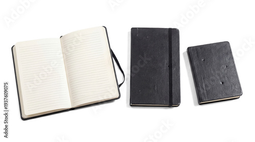 Tableau sur toile an open black lined notebook with a black elastic band and two closed black notebooks of different sizes, arranged on a transparent background