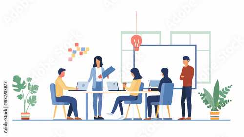 Diverse team collaborating in modern office space with laptops