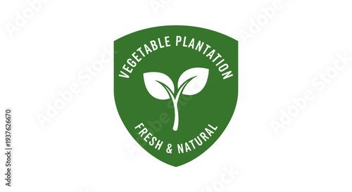 Green Shield Logo with Sprouting Seedling.