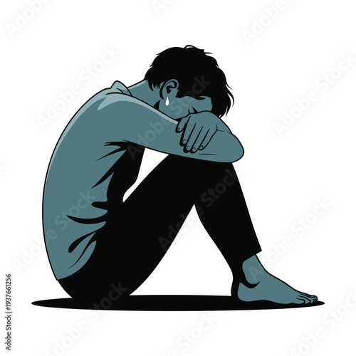 Sad man sitting alone in despair with head in hands