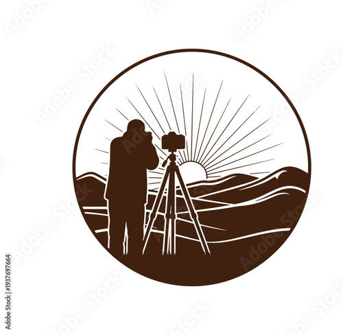 photographer taking picture of sunrise over mountain range with camera on tripod