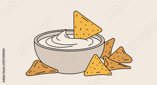 A bowl of creamy white dip with several triangular tortilla chips surrounding it and one chip dipping into the bowl.