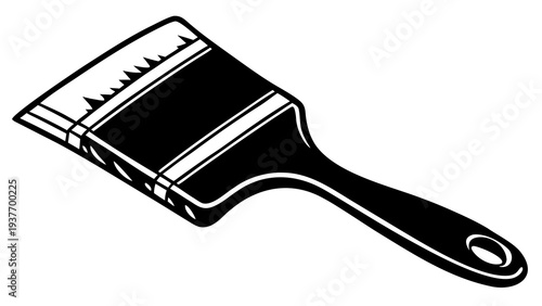 A wide flat paintbrush with dense bristles lies diagonally on a clean white surface.