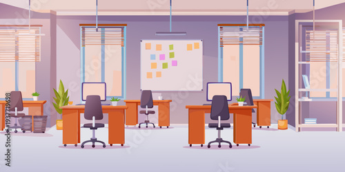 A brightly lit modern office space with desks and a whiteboard