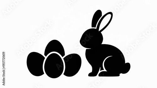 Black silhouette of a rabbit sitting next to eggs on white background easter symbol