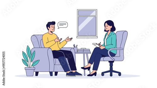 Young man sits in a comfortable armchair and shares his thoughts with a professional psychologist or counselor during a therapy session.