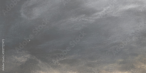 Abstract nature texture of a dark stormy sky with grey clouds and rain falling over a moody city road under blue night light and thick fog