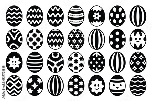 Black and white patterned eggs in a grid arrangement