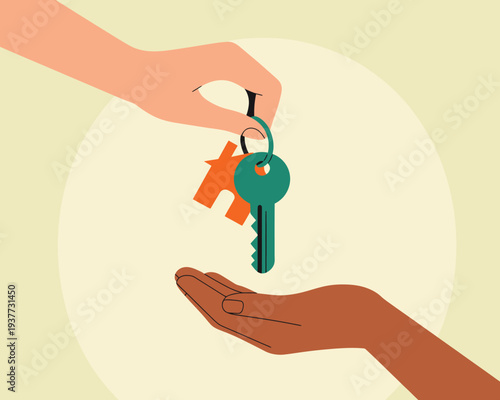 Close-up of hands exchanging keys and a small house charm, symbolizing real estate transaction, buying a home, or moving in.