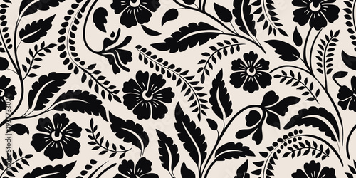 Elegant black floral pattern on a cream colored background
