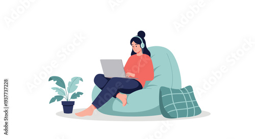 Comfortable woman sitting in a light teal beanbag chair working on a laptop while wearing headphones at home.