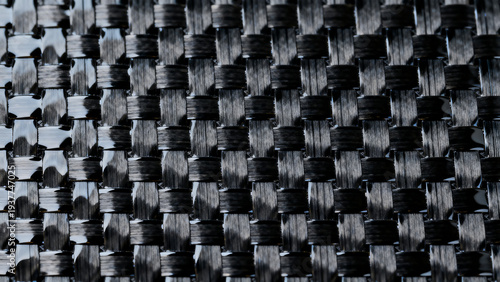 Woven carbon fiber fabric texture background, strength and lightweight material