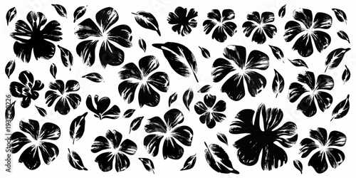 Abstract black and white floral pattern with scattered leaves and blossoms