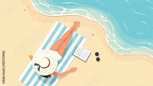 Top-down view of a woman in a wide-brimmed sun hat sunbathing on a striped towel by the ocean waves on a sandy beach.