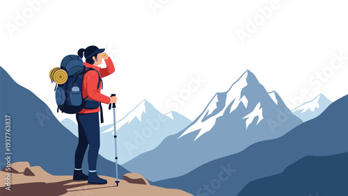 Female traveler with a large backpack stands on a mountain peak using binoculars to look at the distant snow-covered summits.