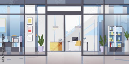 Modern office interior viewed through glass doors and a bright lobby