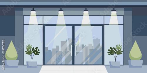 Modern building entrance with glass doors and bright overhead lighting
