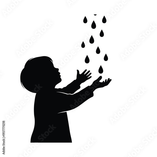 Child enjoying rain shower with hands outstretched