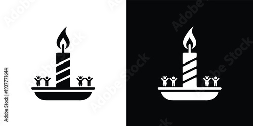 Black and white of people celebrating around a lit candle celebration flame