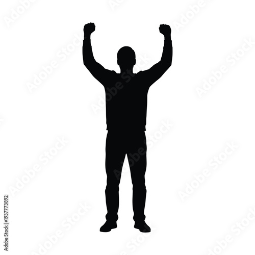 Man celebrating with raised fists in triumphant gesture