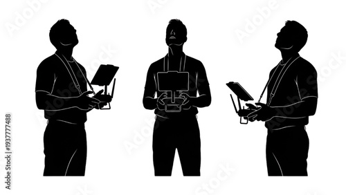 Silhouette of a person operating a drone with a remote control