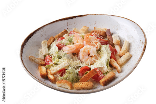 Caesar salad with shrimp and croutons isolated on white background