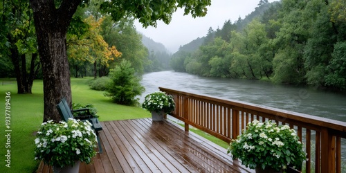 Wooden deck overlooking flowing river during rain