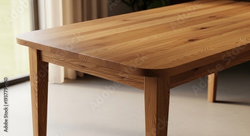 Wooden Table with Rounded Edges and Sturdy Legs.