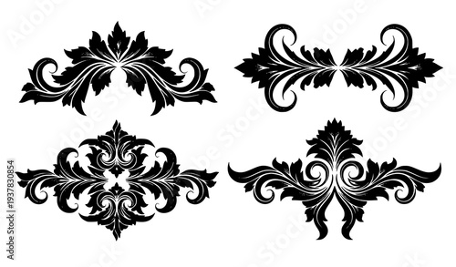 A set of four black and white ornate floral design elements