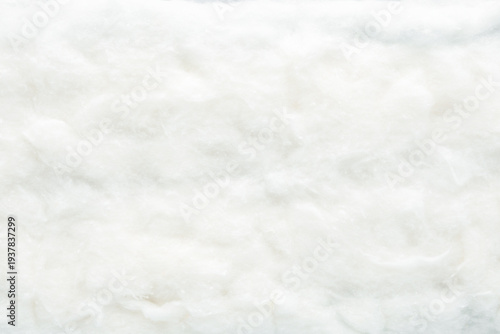 White soft cotton wool background. Closeup. Top down view.