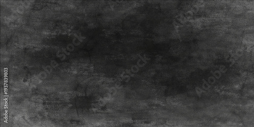 Abstract dark grunge texture creates an intriguing and atmospheric background, ideal for adding depth to design projects. 