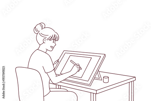 Female digital artist working on graphics tablet coloring page for children and students interested in creative careers and modern technology