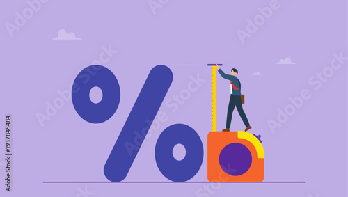 Business financial concept. Businessman using tape measure to measure the height of the percentage symbol.