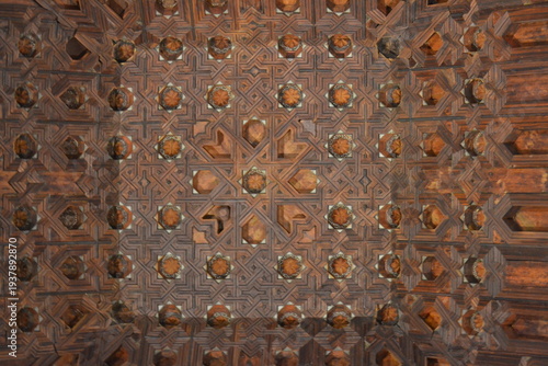 Andalusian art on the facade of an ancient buildin