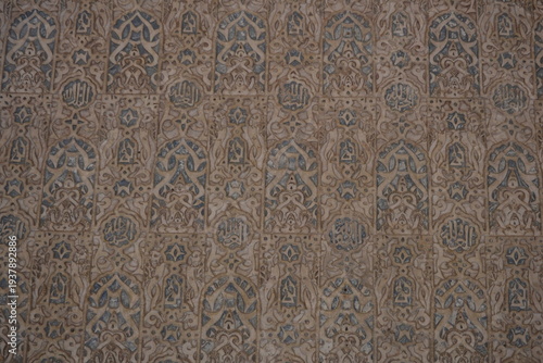Andalusian art on the facade of an ancient buildin