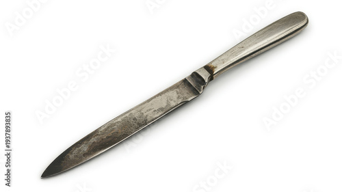 Old metal knife with handle on white blade