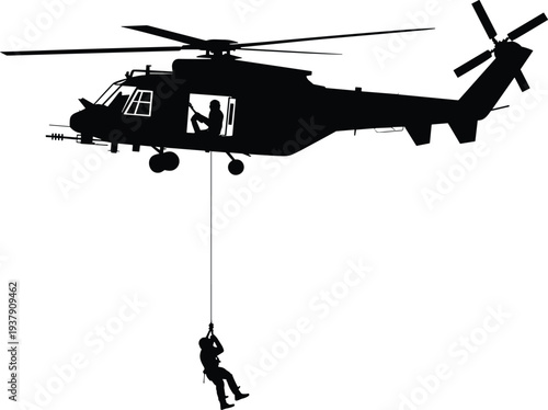 Military rescue helicopter silhouette performing airborne evacuation operation with soldier rappelling during tactical emergency mission