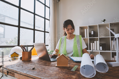 Female engineer working on sustainable building project