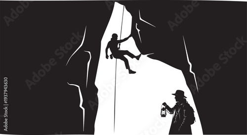 Silhouette of a climber ascending a rock face with a spotlight below