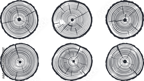 Six black and white tree stump cross sections