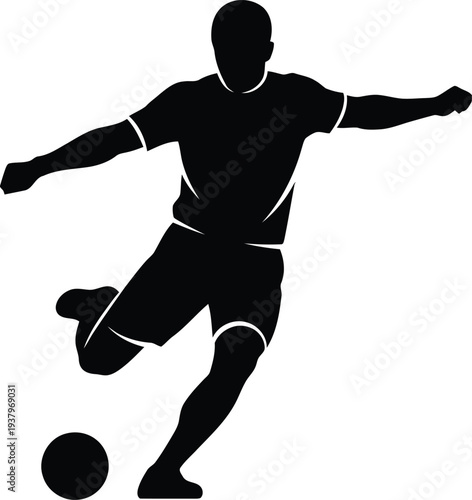 Soccer player kicking a ball in action